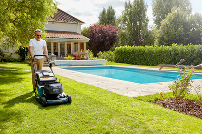 Person cutting grass