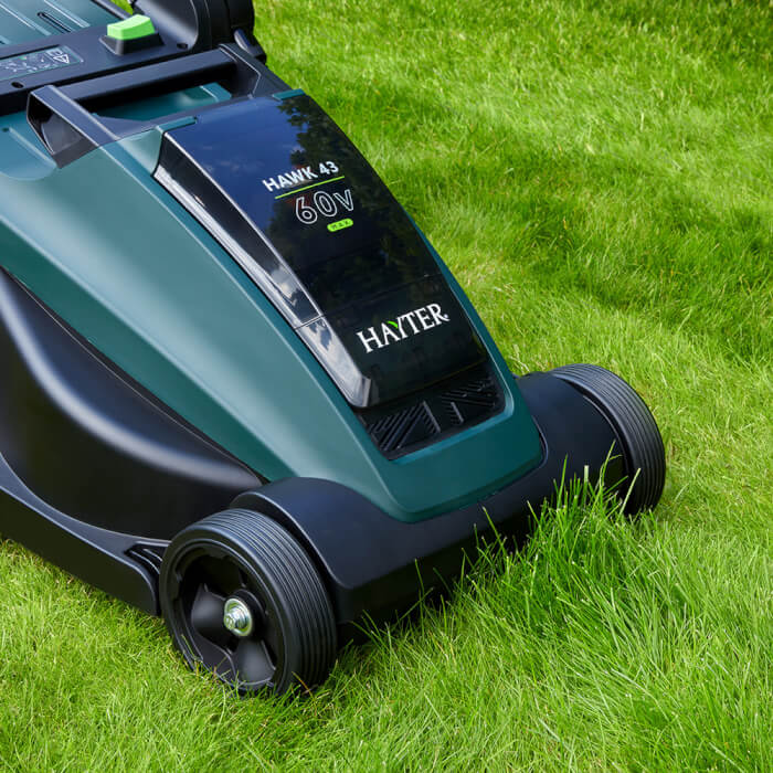 Hawk 43 mowing lush grass with ease